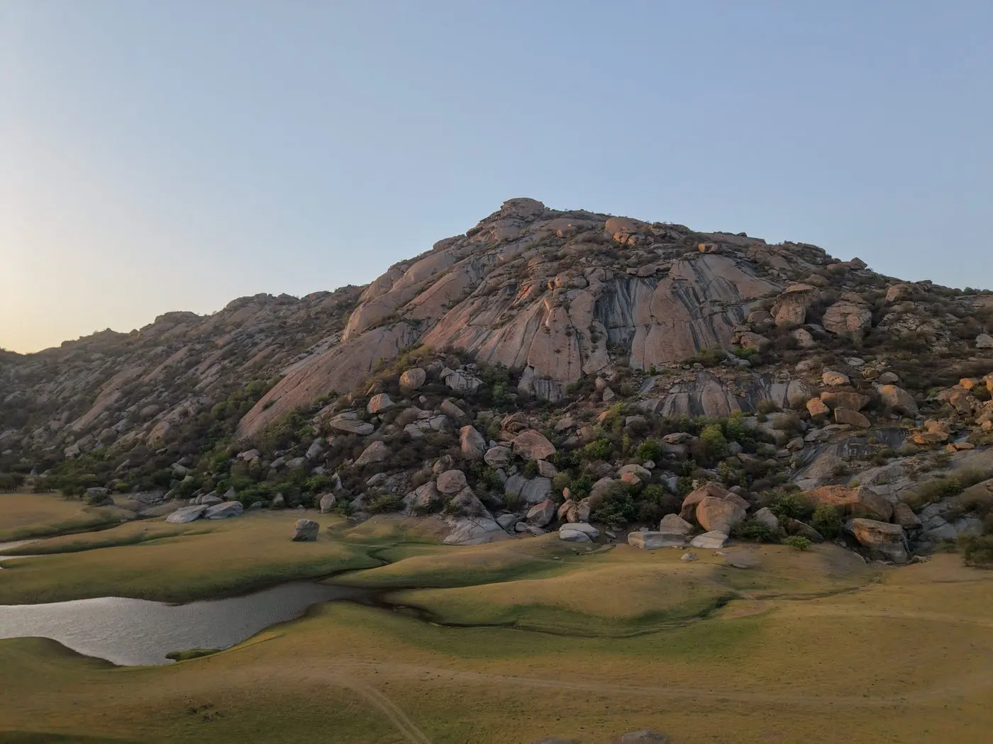 Jawai granite hills and backwater landscape at golden hour
